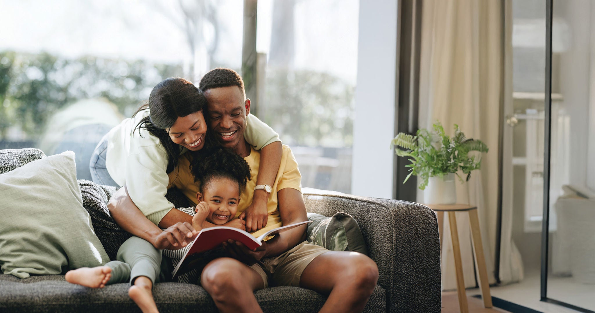 Family  happy in a sofa