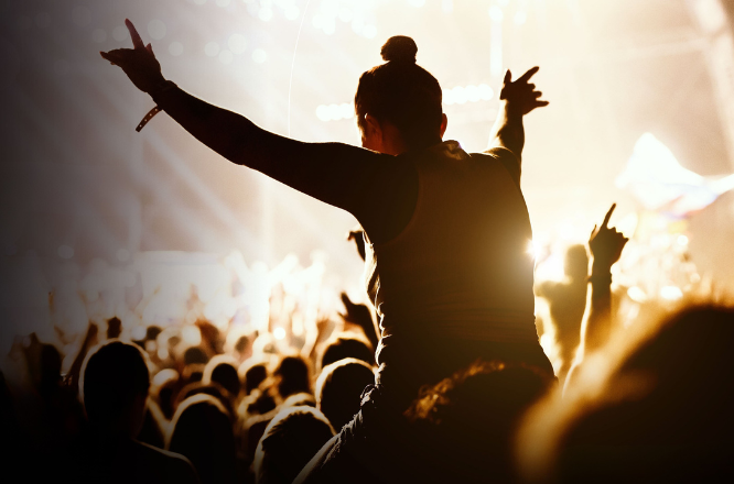 woman enjoying a concert