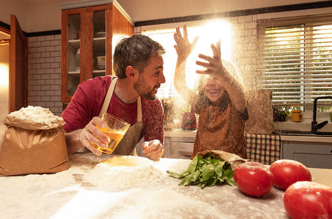 dad and girl cooking