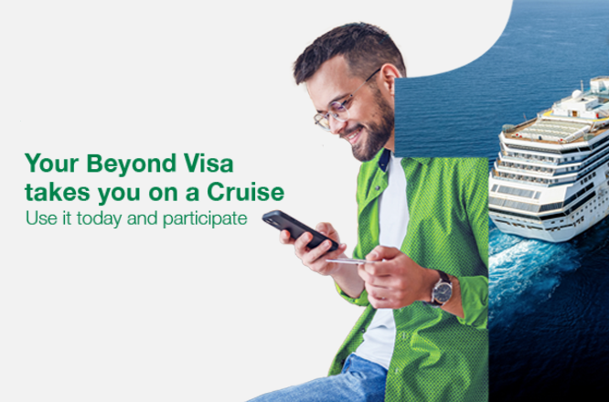 youngman with mobile and beyond credit card on hand a cruise behind